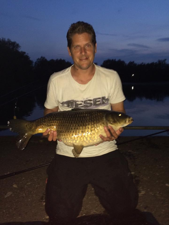 Nick Allsop with a 20lb Common Carp caught at Todd's Pit, Milton Country Park